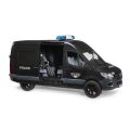 Bruder MB Sprinter with a police officer in heavy clothing