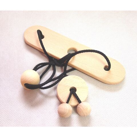 Wooden puzzle knot on board
